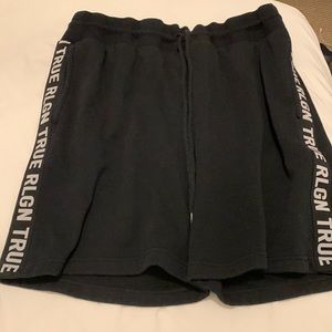 True religion mens sweat shorts with name written down both sides in white
